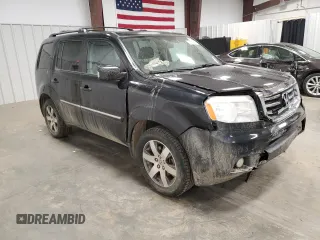 2015 Honda Pilot Touring with VIN 5FNYF4H9XFB038924, listed as a Copart auction lot 51756665 with 189,205 mi miles and Salvage Title. Bid and sale history available at DreamBid. Image 4.