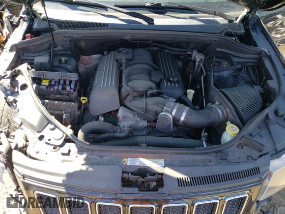 2012 Jeep Grand Cherokee SRT8 with VIN 1C4RJFDJ2CC352056, listed as a Copart auction lot 48810994 with 114,807 mi miles and Salvage Title. Bid and sale history available at carsss.com. Image 11.