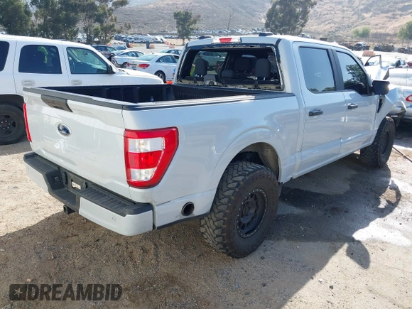 2021 Ford F-150 XL with VIN 1FTEW1CP5MKD48227, listed as a IAAI auction lot 42272809 with 87,614 mi miles and . Bid and sale history available at DreamBid. Image 4.