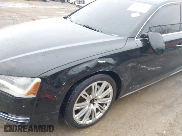 2014 Audi A8 3.0T z VIN WAURGAFD5EN004118, wystawiony jako IAAI lot #41919506 z przebiegiem 182 382 mil mil oraz . Historia ofert i sprzedaży dostępna na DreamBid. Obrazek 6.