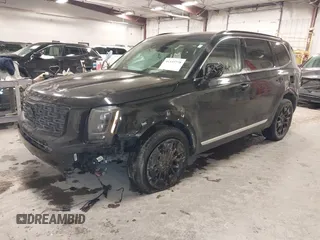 2021 Kia Telluride EX with VIN 5XYP3DHC5MG105113, listed as a IAAI auction lot 41395778 with 90,353 mi miles and . Bid and sale history available at DreamBid. Image 2.
