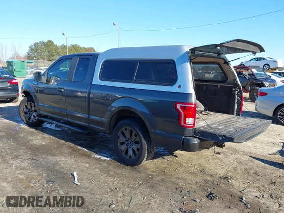 2015 Ford F-150 XL with VIN 1FTEX1C85FKD46390, listed as a IAAI auction lot 41367960 with 209,889 mi miles. Bid and sale history available at carsss.com. Image 3.