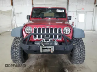 2012 Jeep Wrangler Sport with VIN 1C4AJWAG5CL233049, listed as a Copart auction lot 52328865 with 185,388 mi miles and Salvage title. Bid and sale history available at DreamBid. Image 5.