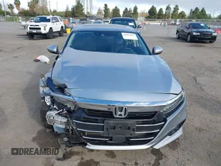2021 Honda Accord Touring z VIN 1HGCV2F99MA032916, wystawiony jako IAAI lot #42019607 z przebiegiem 64 344 mil mil oraz . Historia ofert i sprzedaży dostępna na DreamBid. Obrazek 13.