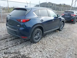 2019 Mazda CX-5 Touring with VIN JM3KFBCM5K0689948, listed as a IAAI auction lot 41976266 with 74,812 mi miles. Bid and sale history available at carsss.com. Image 4.