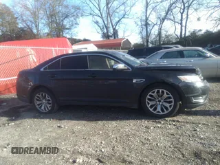 2014 Ford Taurus Limited with VIN 1FAHP2F80EG101504, listed as a IAAI auction lot 40974783 with 177,522 mi miles. Bid and sale history available at carsss.com. Image 13.