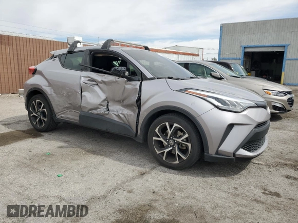 2020 Toyota C-HR LE with VIN JTNKHMBX7L1065098, listed as a Copart auction lot 50101395 with 51,933 mi miles and Salvage Title. Bid and sale history available at DreamBid. Image 4.