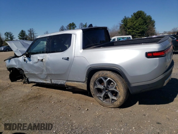 2023 Rivian R1T Adventure with VIN 7FCTGBAA8PN027711, listed as a Copart auction lot 49449155 with 16,031 mi miles and Salvage Title. Bid and sale history available at carsss.com. Image 2.
