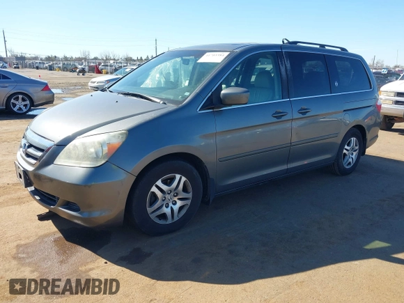 2007 Honda Odyssey EX-L z VIN 5FNRL386X7B405321, wystawiony jako IAAI lot #41703384 z przebiegiem 198 552 mil mil oraz . Historia ofert i sprzedaży dostępna na DreamBid. Obrazek 2.