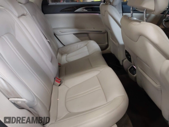2016 Lincoln MKZ Hybrid with VIN 3LN6L2LU0GR608232, listed as a IAAI auction lot 41034486 with 99,637 mi miles and . Bid and sale history available at DreamBid. Image 8.