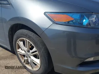 2010 Honda Insight EX with VIN JHMZE2H72AS015870, listed as a IAAI auction lot 42762384 with 58,121 mi miles and . Bid and sale history available at DreamBid. Image 14.