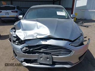 2020 Ford Fusion SE z VIN 3FA6P0HD9LR231471, wystawiony jako IAAI lot #41986473 z przebiegiem 58 587 mil mil oraz . Historia ofert i sprzedaży dostępna na DreamBid. Obrazek 13.