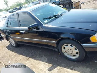 1997 Mercedes-Benz C z VIN WDBHA23E7VF501943, wystawiony jako IAAI lot #42275734 z przebiegiem Nie podano mil oraz . Historia ofert i sprzedaży dostępna na DreamBid. Obrazek 13.