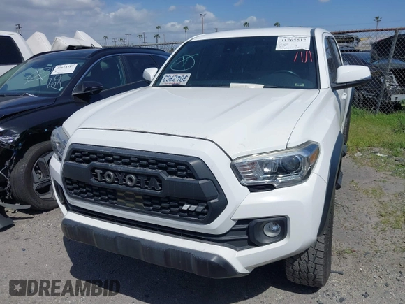 2021 Toyota Tacoma 4WD SR5 with VIN 3TMDZ5BN7MM103321, listed as a IAAI auction lot 41765512 with 49,009 mi miles. Bid and sale history available at carsss.com. Image 13.