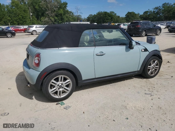 2014 MINI Cooper Convertible with VIN WMWZN3C53ET861483, listed as a Copart auction lot 52788785 with 20,274 mi miles and Salvage Title. Bid and sale history available at carsss.com. Image 3.