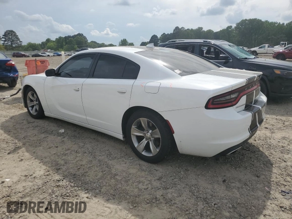 2015 Dodge Charger SXT with VIN 2C3CDXHGXFH865725, listed as a Copart auction lot 54217975 with 147,494 mi miles and Salvage Title. Bid and sale history available at DreamBid. Image 2.