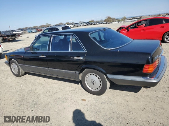 1989 Mercedes-Benz 560 with VIN WDBCA39D8KA437872, listed as a Copart auction lot 45689195 with 151,851 mi miles and Clean Title. Bid and sale history available at DreamBid. Image 2.
