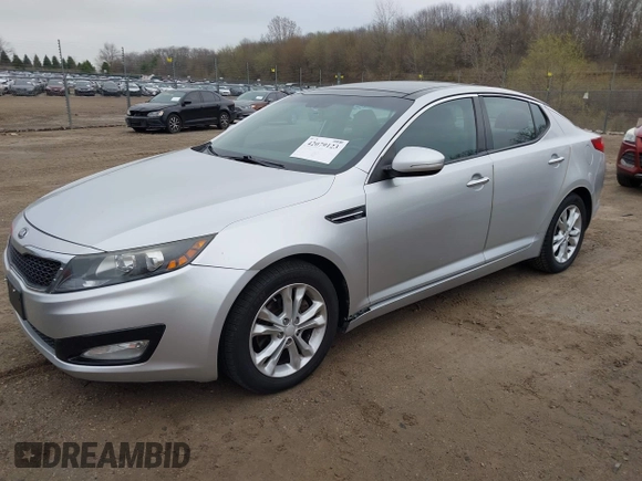 2013 Kia Optima EX with VIN 5XXGN4A72DG153731, listed as a IAAI auction lot 42079123 with 137,081 mi miles. Bid and sale history available at carsss.com. Image 2.