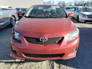 2010 Toyota Corolla with VIN 1NXBU4EE1AZ231682, listed as a Copart auction lot 84146264 with 194,949 mi miles and Salvage Title. Bid and sale history available at DreamBid. Image 5.