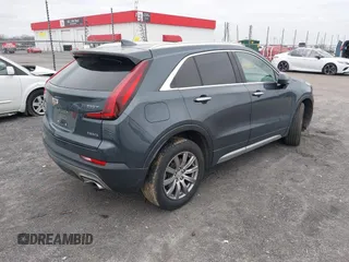 2020 Cadillac XT4 AWD Premium Luxury with VIN 1GYFZDR45LF062180, listed as a IAAI auction lot 41599215 with 105,350 mi miles. Bid and sale history available at carsss.com. Image 4.