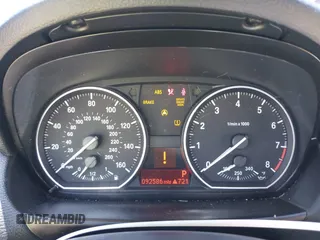 2010 BMW 1 Series 135i with VIN WBAUN9C55AVK42007, listed as a IAAI auction lot 42526510 with 92,586 mi miles and . Bid and sale history available at DreamBid. Image 7.