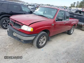 1999 Mazda B-Series 2WD Truck SE with VIN 4F4YR16X9XTM36395, listed as a IAAI auction lot 41398685 with 256,929 mi miles. Bid and sale history available at carsss.com. Image 2.