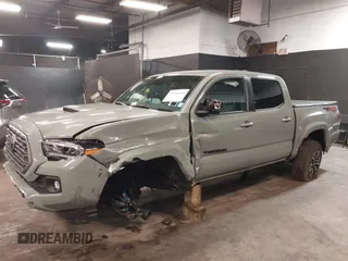 2023 Toyota Tacoma 4WD SR with VIN 3TMCZ5ANXPM607489, listed as a IAAI auction lot 41605018 with 15,229 mi miles. Bid and sale history available at carsss.com. Image 6.