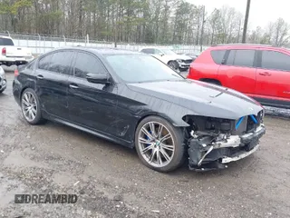 2018 BMW 5 Series M550i xDrive with VIN WBAJB9C59JB049114, listed as a IAAI auction lot 41543633 with 87,942 mi miles. Bid and sale history available at carsss.com. Image 1.