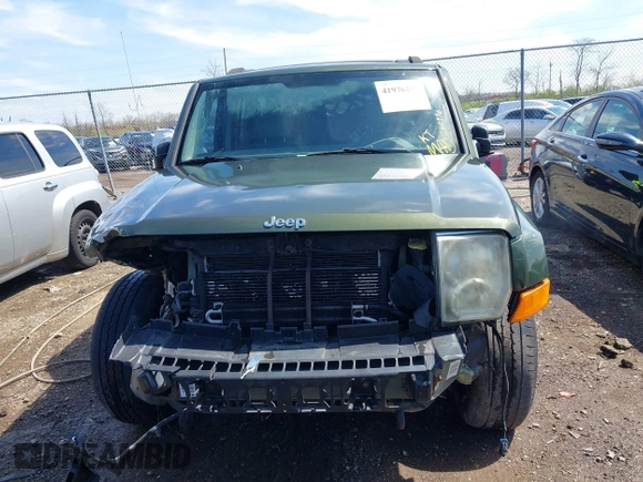 2007 Jeep Commander Sport with VIN 1J8HG48P97C691117, listed as a IAAI auction lot 41976259 with 260,996 mi miles. Bid and sale history available at carsss.com. Image 13.