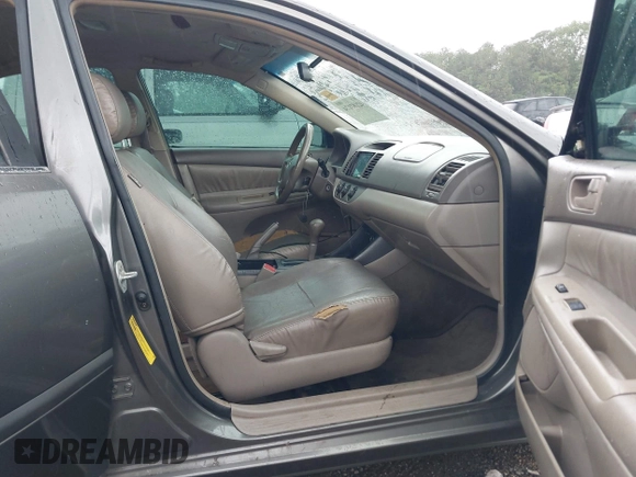 2004 Toyota Camry LE with VIN 4T1BE30K24U921028, listed as a IAAI auction lot 42187174 with 295,174 mi miles and . Bid and sale history available at DreamBid. Image 5.