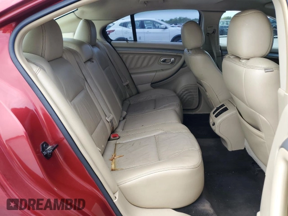 2015 Ford Taurus SEL with VIN 1FAHP2E87FG187946, listed as a Copart auction lot 53481575 with 119,746 mi miles and Salvage Title. Bid and sale history available at carsss.com. Image 10.