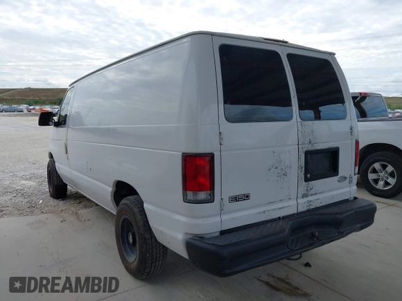 2001 Ford Econoline Cargo with VIN 1FTRE14261HA22632, listed as a IAAI auction lot 41202164 with 153,412 mi miles and . Bid and sale history available at DreamBid. Image 3.