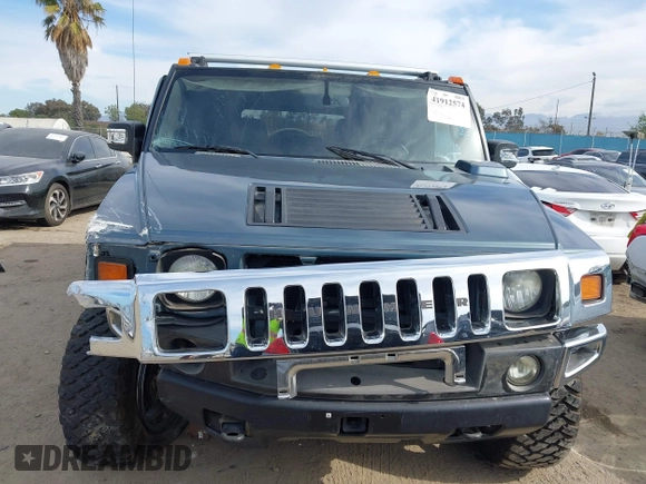2005 Hummer H2 SUV with VIN 5GRGN23U35H105620, listed as a IAAI auction lot 41912574 with 232,938 mi miles. Bid and sale history available at carsss.com. Image 13.