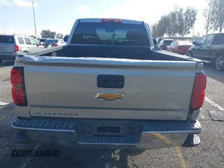 2014 Chevrolet Silverado 1500 with VIN 1GCNCREH2EZ303297, listed as a IAAI auction lot 41692877 with 115,621 mi miles and . Bid and sale history available at DreamBid. Image 16.