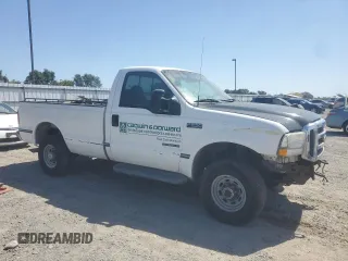 2000 Ford F-250 XL with VIN 1FTNF21F0YEC85459, listed as a Copart auction lot 63040505 with 328,049 mi miles and Salvage title. Bid and sale history available at DreamBid. Image 4.