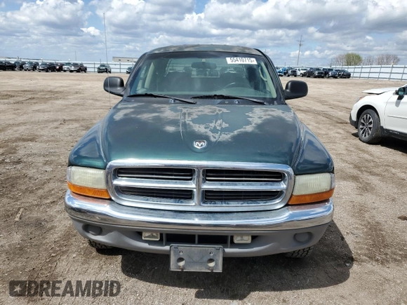 2001 Dodge Dakota z VIN 1B7HG2AX81S320355, wystawiony jako Copart lot #55410715 z przebiegiem 164 931 mil mil oraz Szkoda całkowita • Salvage title. Historia ofert i sprzedaży dostępna na DreamBid. Obrazek 5.