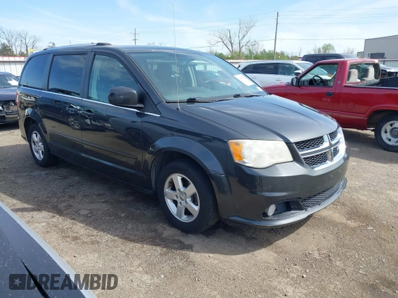 2011 Dodge Grand Caravan Crew with VIN 2D4RN5DG3BR660235, listed as a IAAI auction lot 41945522 with 148,924 mi miles and . Bid and sale history available at DreamBid. Image 1.