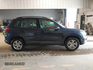 2016 Volkswagen Tiguan S with VIN WVGBV7AXXGW565289, listed as a IAAI auction lot 42113317 with 83,537 mi miles and . Bid and sale history available at DreamBid. Image 13.
