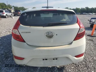 2012 Hyundai Accent SE with VIN KMHCU5AE4CU009351, listed as a Copart auction lot 61963395 with 138,384 mi miles and Clean title. Bid and sale history available at DreamBid. Image 6.