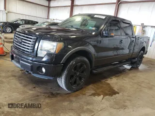 2011 Ford F-150 XL with VIN 1FTFW1EF7BFA71238, listed as a Copart auction lot 65565865 with 136,829 mi miles and Salvage title. Bid and sale history available at DreamBid. Image 1.