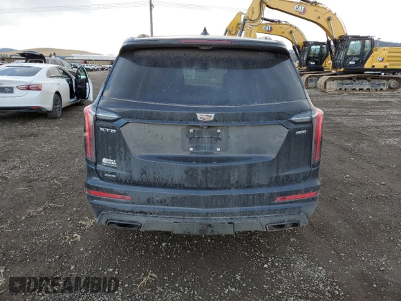 2021 Cadillac XT6 AWD Sport z VIN 1GYKPHRSXMZ164181, wystawiony jako Copart lot #84267124 z przebiegiem 70 658 mil mil oraz Szkody całkowita. Historia ofert i sprzedaży dostępna na DreamBid. Obrazek 6.