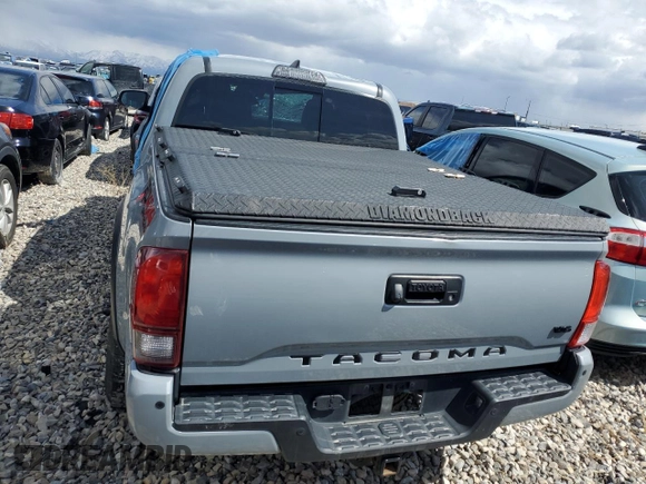 2019 Toyota Tacoma SR z VIN 3TMCZ5AN9KM206637, wystawiony jako Copart lot #48753665 z przebiegiem 88 864 mil mil oraz Szkoda całkowita • Salvage title. Historia ofert i sprzedaży dostępna na DreamBid. Obrazek 6.