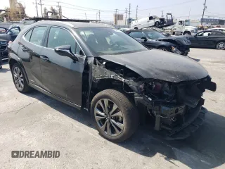 2022 Lexus UX 250h F Sport with VIN JTHE9JBH7N2059948, listed as a Copart auction lot 68671394 with 84,729 mi miles and Salvage Title. Bid and sale history available at DreamBid. Image 4.