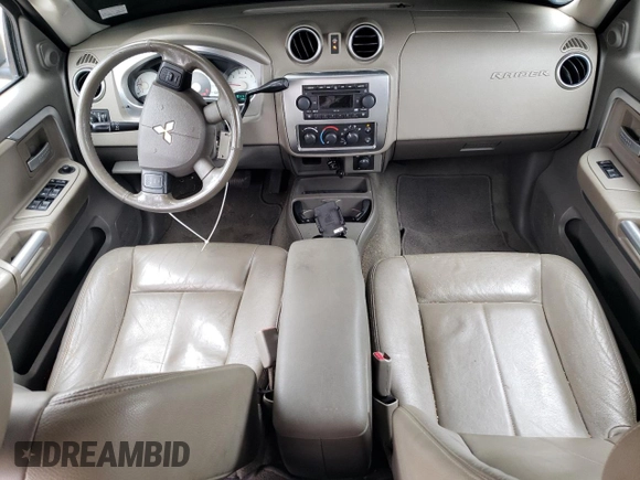 2006 Mitsubishi Raider z VIN 1Z3HT48N36S540902, wystawiony jako Copart lot #73397504 z przebiegiem 126 311 mil mil oraz Czysty tytuł • Clean title. Historia ofert i sprzedaży dostępna na DreamBid. Obrazek 8.