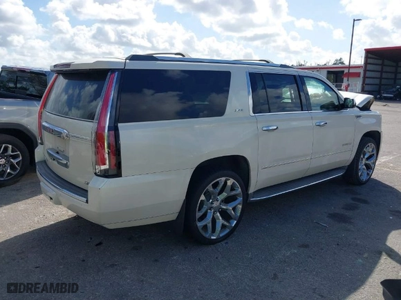 2015 GMC Yukon XL Denali with VIN 1GKS1JKJ0FR504266, listed as a IAAI auction lot 41564098 with 148,203 mi miles. Bid and sale history available at carsss.com. Image 4.