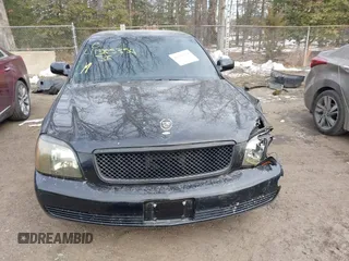 2003 Cadillac DeVille with VIN 1G6KD54Y33U126184, listed as a IAAI auction lot 41385354 with 83,982 mi miles. Bid and sale history available at carsss.com. Image 12.