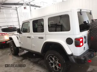 2022 Jeep Wrangler Unlimited Rubicon z VIN 1C4HJXFG7NW106446, wystawiony jako IAAI lot #41405202 z przebiegiem 39 755 mil mil oraz . Historia ofert i sprzedaży dostępna na DreamBid. Obrazek 14.