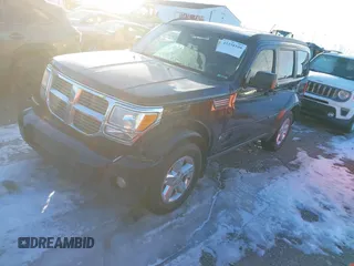 2007 Dodge Nitro SLT with VIN 1D8GU58K27W549214, listed as a IAAI auction lot 41358109 with 99,530 mi miles. Bid and sale history available at carsss.com. Image 2.