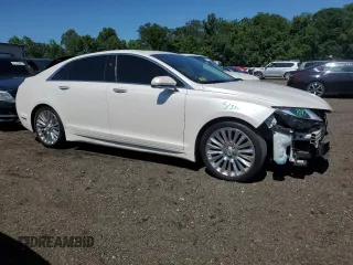 2015 Lincoln MKZ z VIN 3LN6L2JK8FR616661, wystawiony jako Copart lot #61588325 z przebiegiem 65 382 mil mil oraz Szkoda całkowita • Salvage title. Historia ofert i sprzedaży dostępna na DreamBid. Obrazek 4.