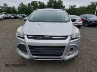2013 Ford Escape SE z VIN 1FMCU9G9XDUC40645, wystawiony jako Copart lot #62681275 z przebiegiem 117 744 mil mil oraz Czysty tytuł • Clean title. Historia ofert i sprzedaży dostępna na DreamBid. Obrazek 5.